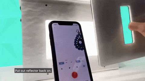 Position the dangle earrings using the Aerial earrings holder