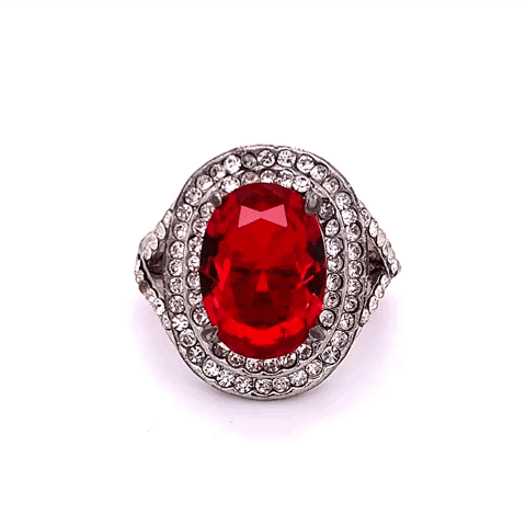 A big red synthetic ruby ring captured using the GemLightbox, iPhone, and GemLightbox turntable.