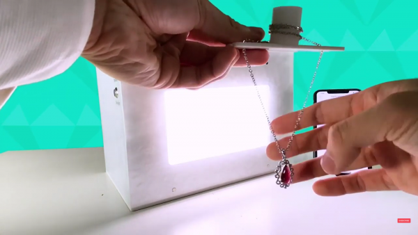 Step 2 wrap the chain around the necklace holder