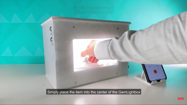 Step 3 place the aquamarine inside the GemLightbox