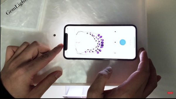 Position your smartphone on the top of the GemLightbox